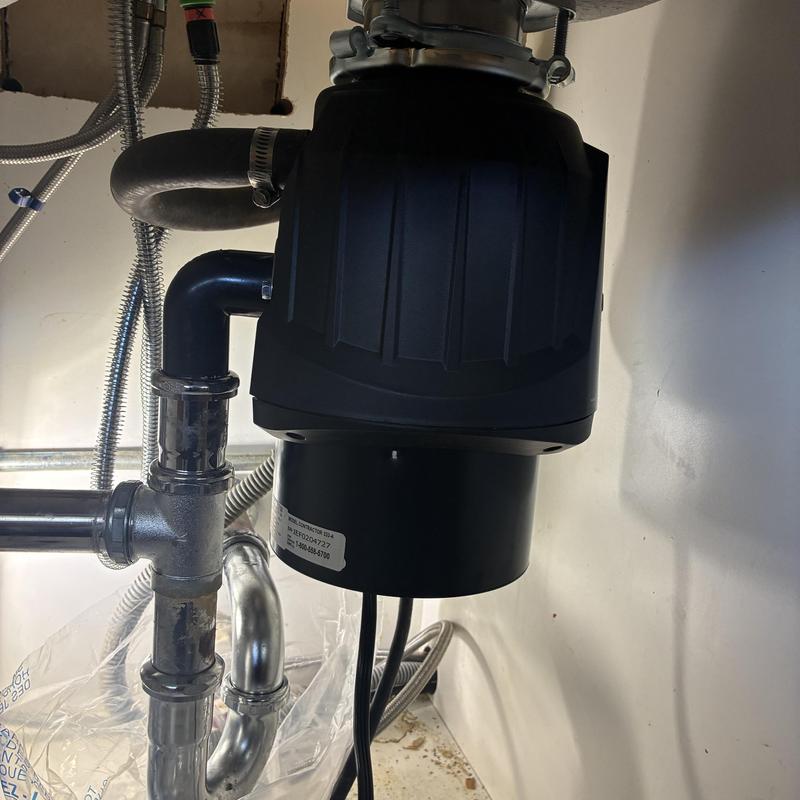 Garbage disposal unit with new plumbing connections