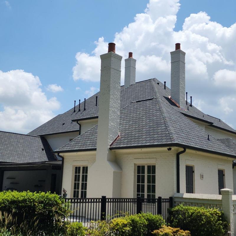 Certainteed Highland Slate roofing on white brick home