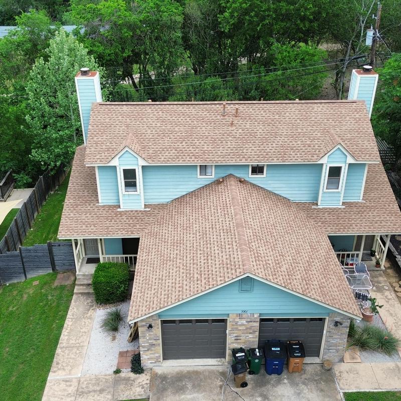 30-year architectural shingle roof with ridge vent in Austin