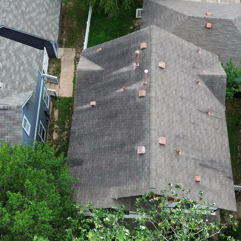Asphalt shingle roof with vent flashings in Kyle, TX