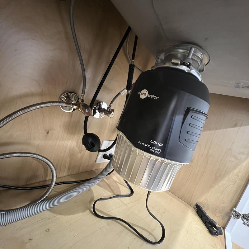1.25 HP garbage disposal installed under sink