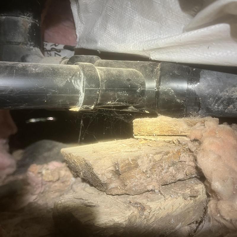 Kitchen sink drain pipe with support blocks installed