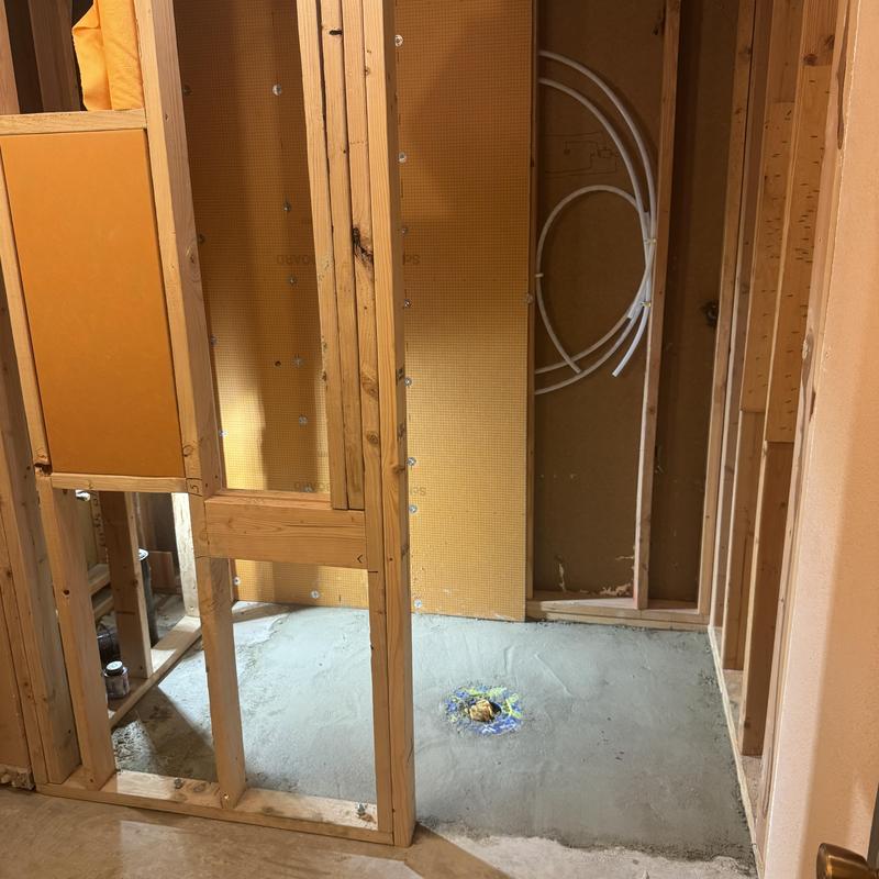 Zero entry shower niche framing and valve plumbing