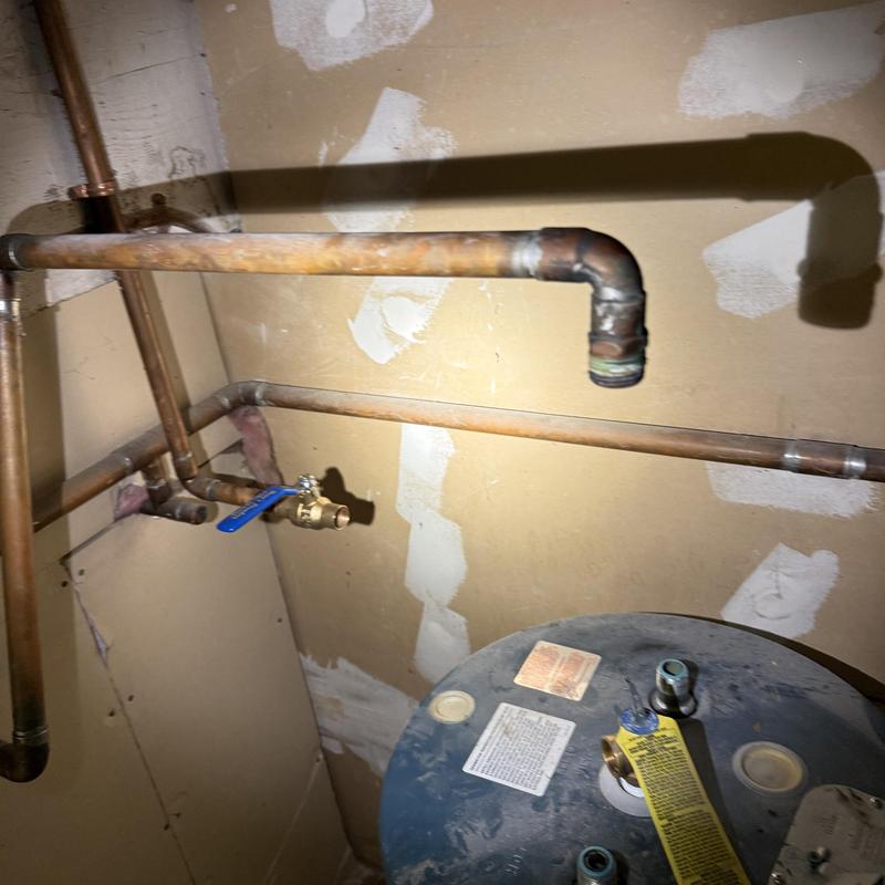 Electric water heater with copper piping in attic