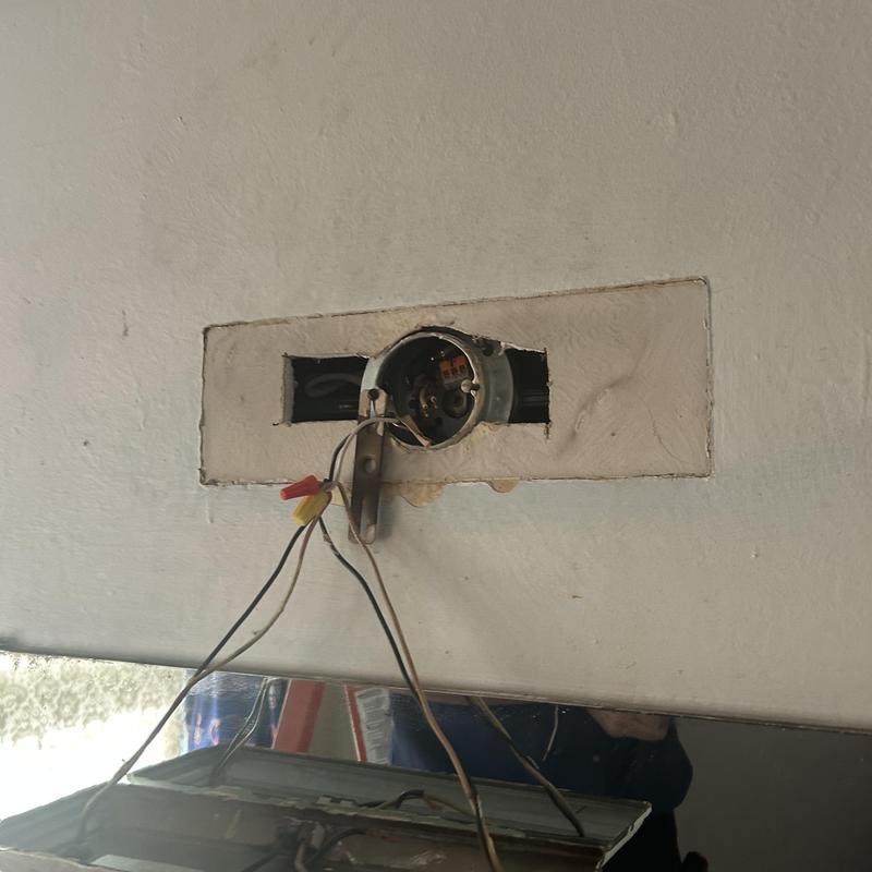 Bathroom light wiring box with exposed cloth wiring