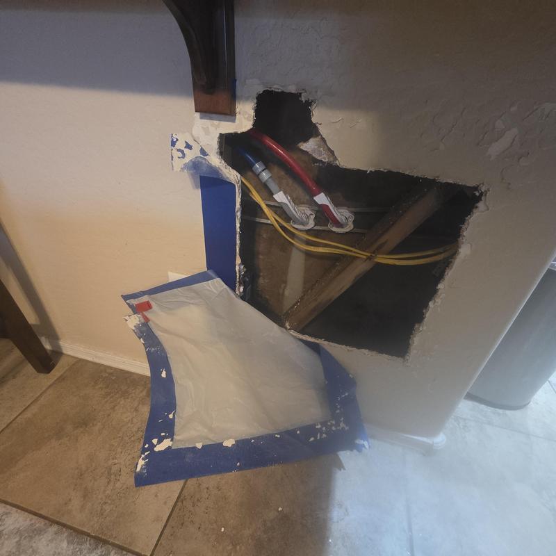 Cold water PEX line in wall under kitchen cabinets
