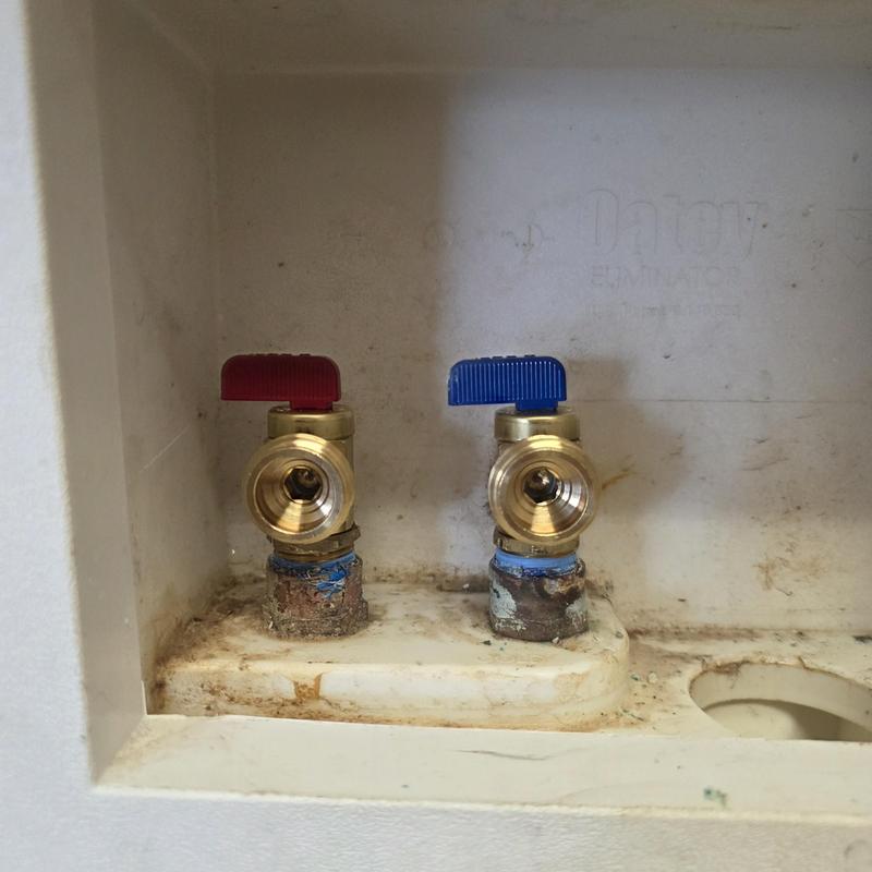 Washer box valves with red and blue handles