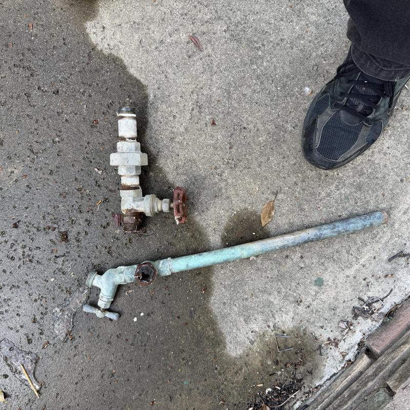 Lawn irrigation copper piping and valve removed