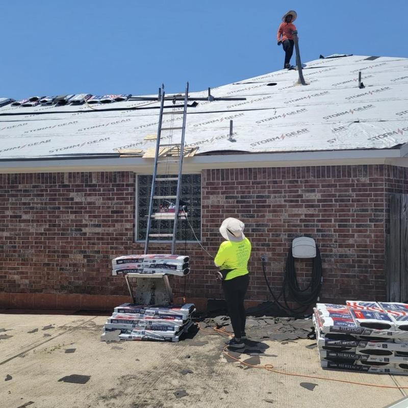 Synthetic roof underlayment installation on residential roof