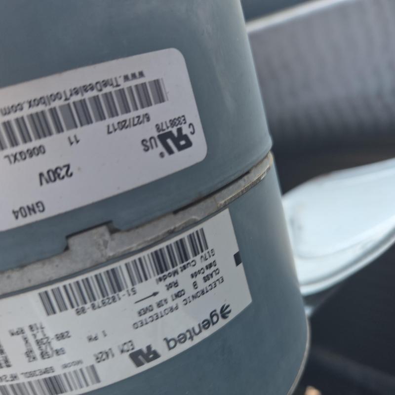 Rheem condenser fan motor with labels and fan blade