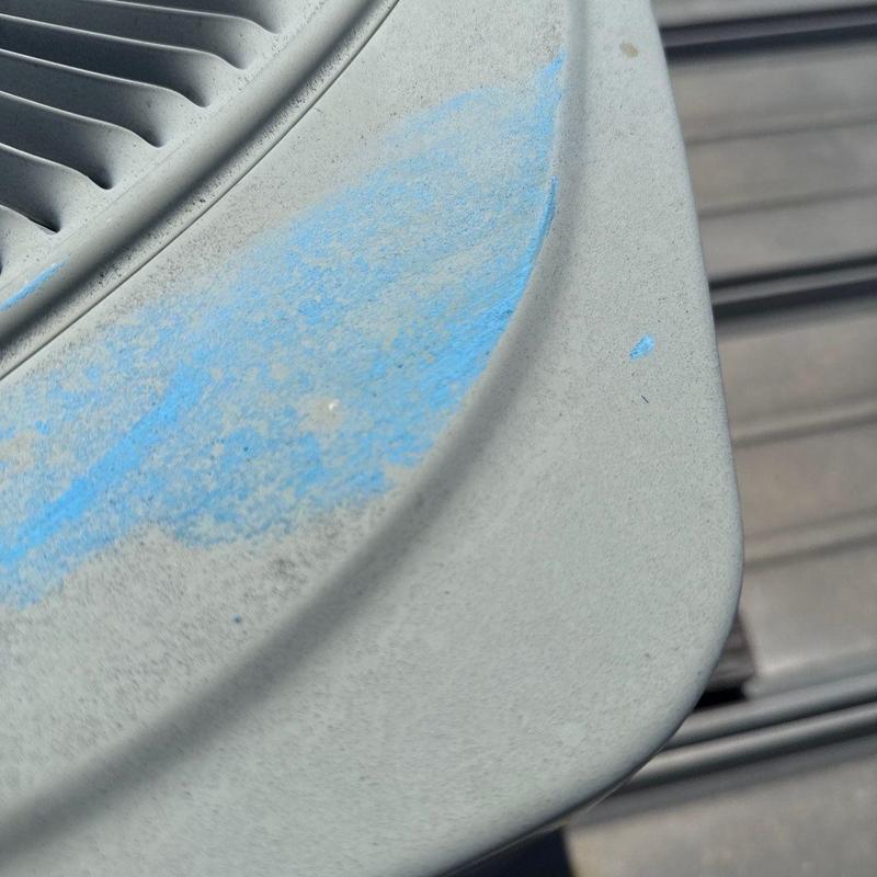Air conditioner condenser dirty plastic cover close-up