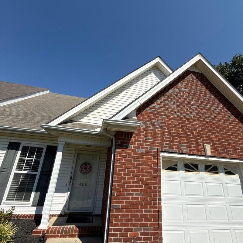 Asphalt shingles hail damage on residential roof