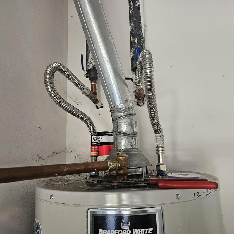 Water heater flexible connectors with vent pipe