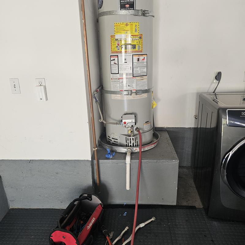 Water heater with new flexible connectors installed