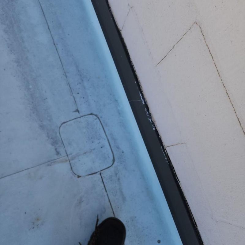 TPO flat roof membrane and wall flashing detail TPO flat roof membrane and wall flashing detail