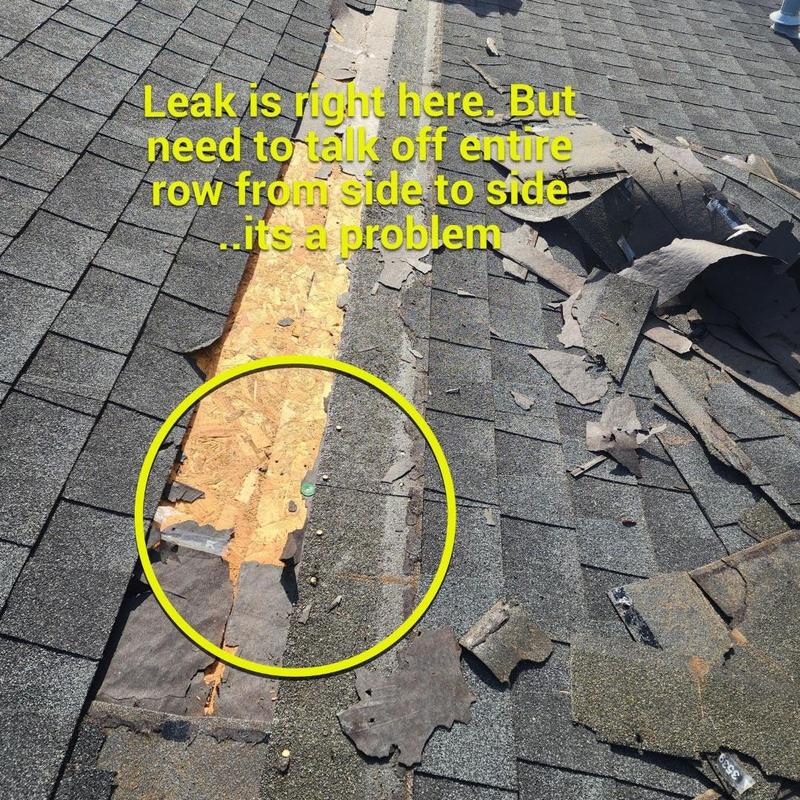Asphalt shingle roof section with exposed decking and damage Asphalt shingle roof section with exposed decking and damage