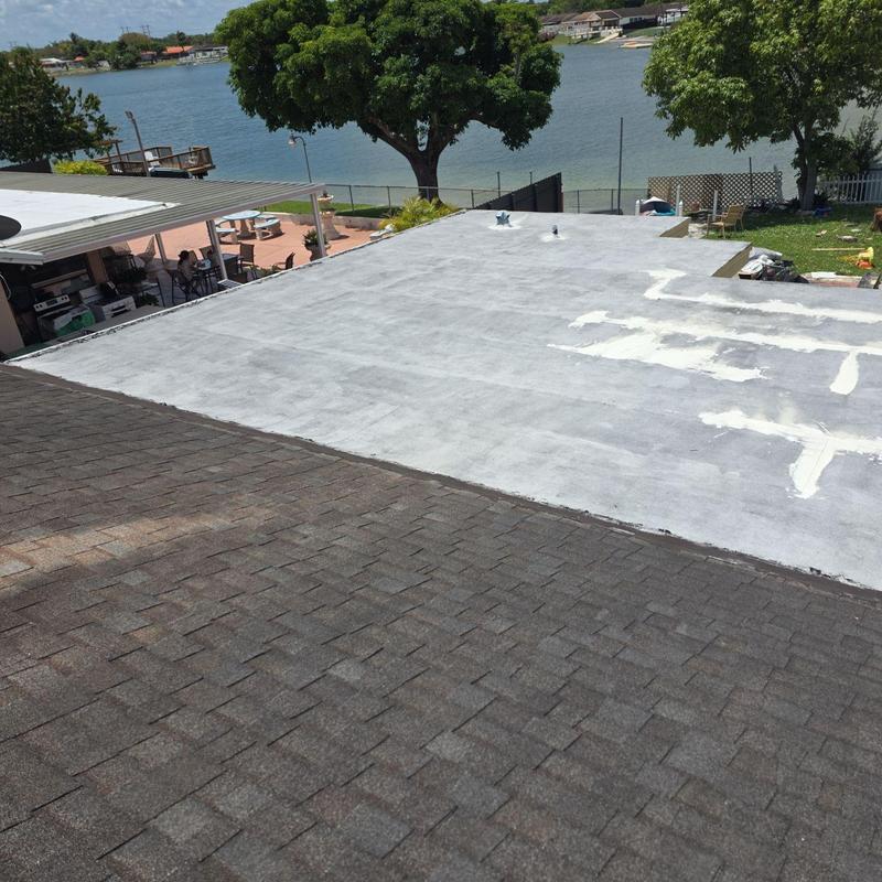 Flat roof with GAF capsheet and timberline shingles