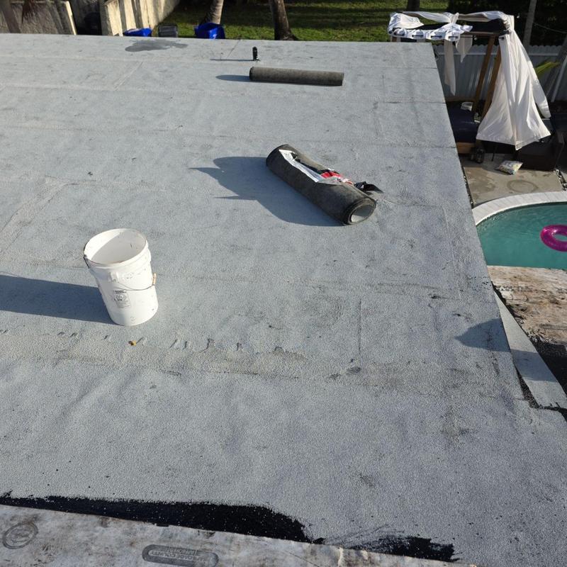 Flat roof membrane with repair materials and tools
