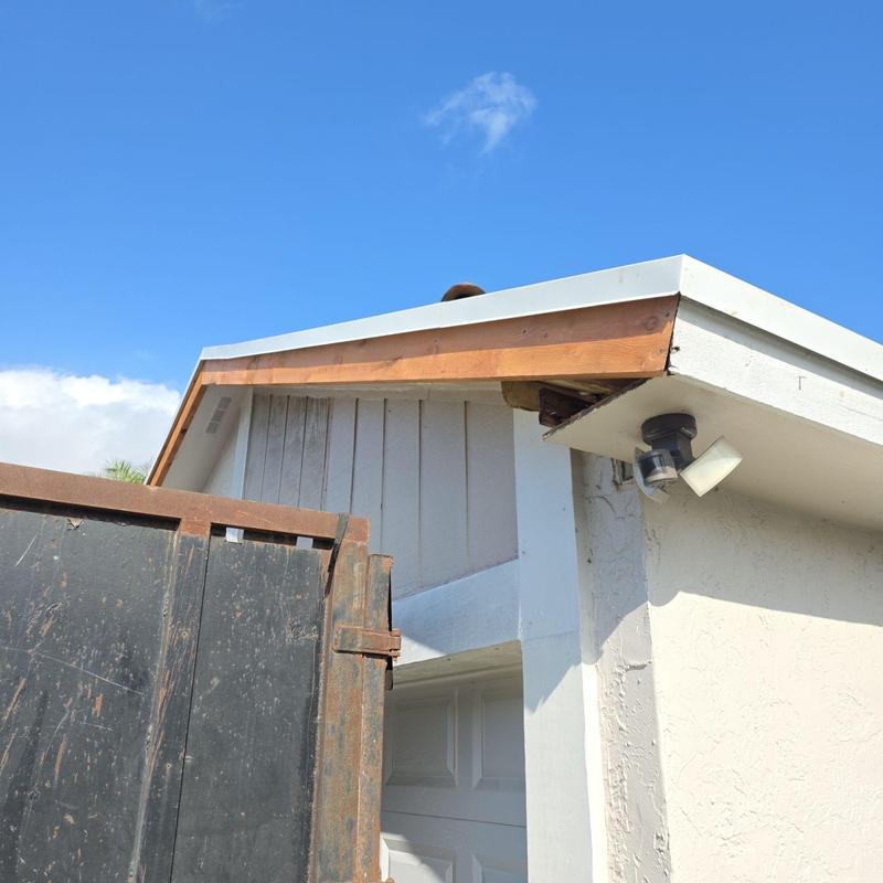 Shingle roof replacement with exposed wood fascia trim