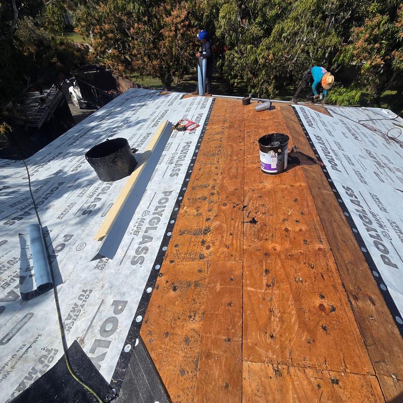 Tile roof underlayment installation on flat roof