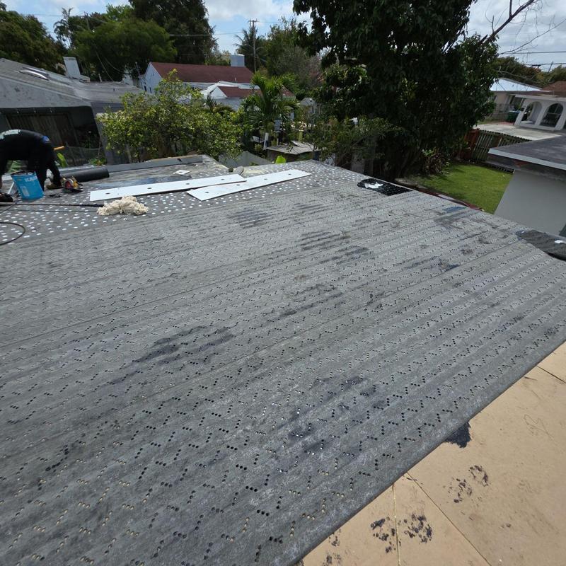 GAF capsheet flat roof installation with tapered insulation