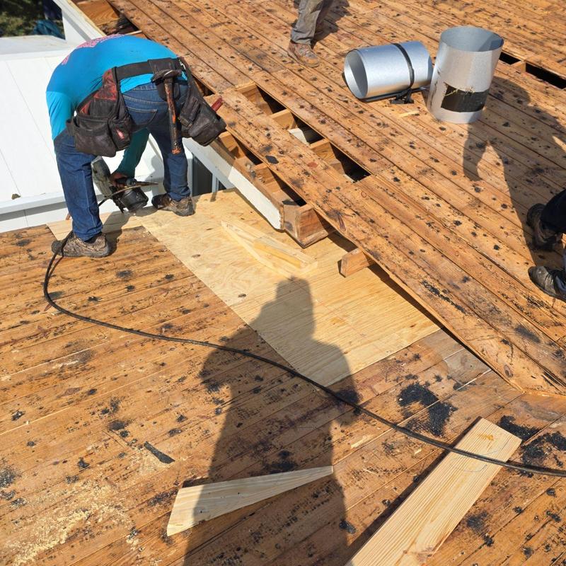Roof decking replacement with plywood sheets on shingle roof
