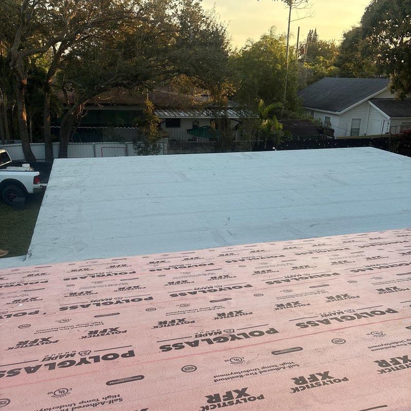 Polyglass roofing underlayment installation on flat roof