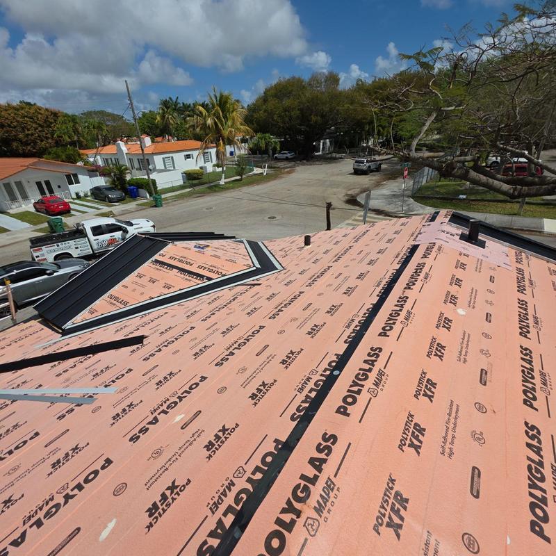 Standing seam metal roof underlayment installation