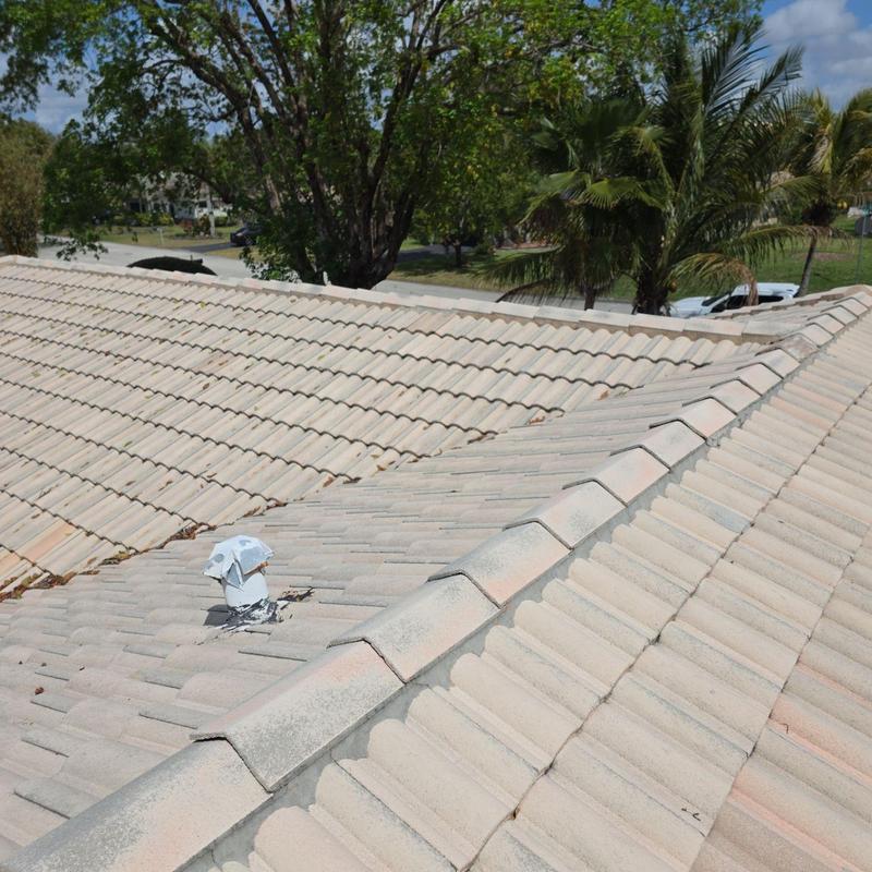 Concrete tile roof with vent pipe in Miami, FL