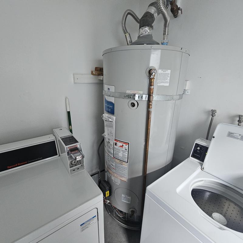 Commercial gas water heater pilot light and thermopile inspection