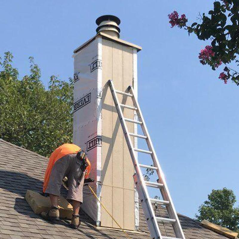 Chimney chase siding and trim replacement with ladder