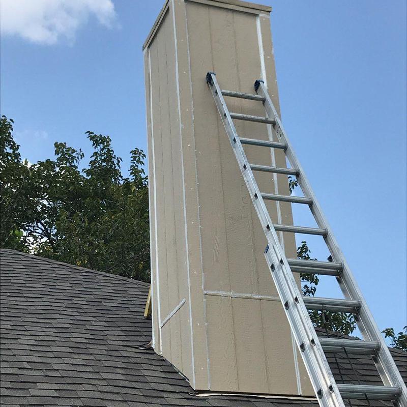 Chimney chase with new LP SmartSide siding and trim
