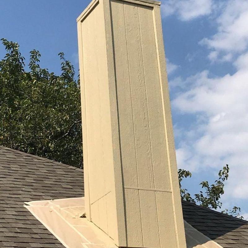 Chimney chase with LP SmartSide siding and trim