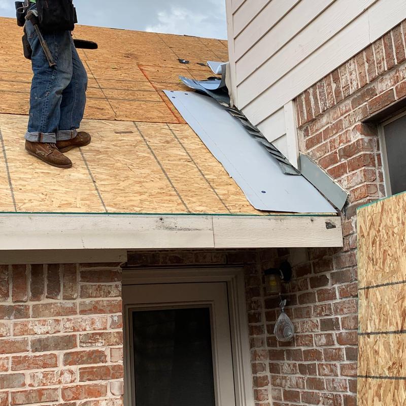 Roof decking replacement with metal flashing installation