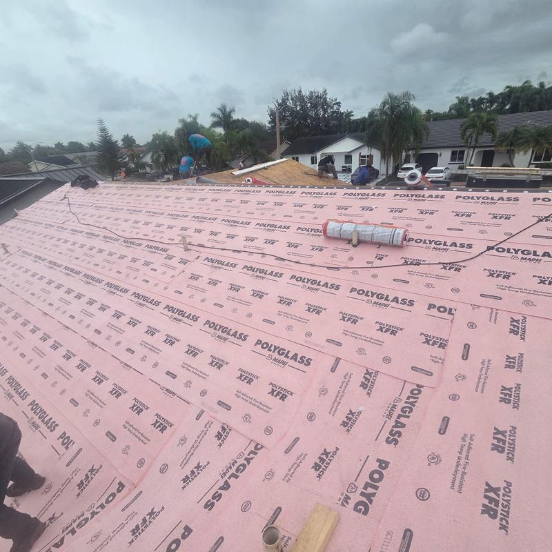 Standing Seam Metal Roof insulation installation in Miami