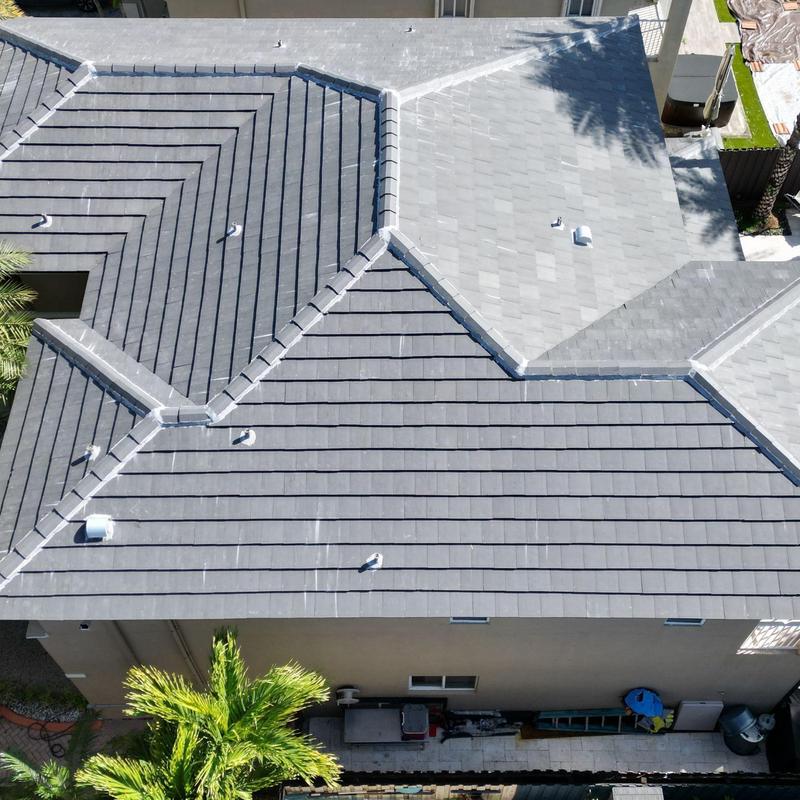 Concrete tile roof with vents in Miami, FL