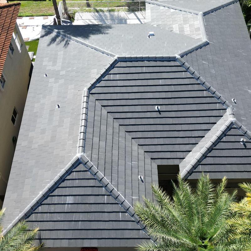 Concrete tile roof with new ridge caps in Miami FL