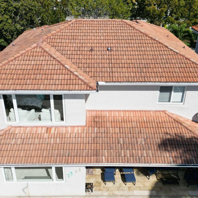 Concrete tile roof with ridge cap and vents