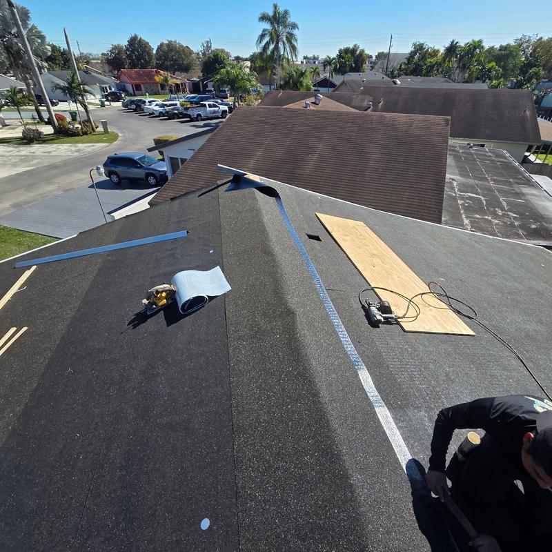 Shingle roof underlay installation on residential roof