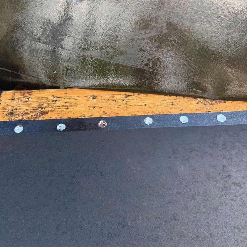 Roof underlayment installation with fasteners and wood deck
