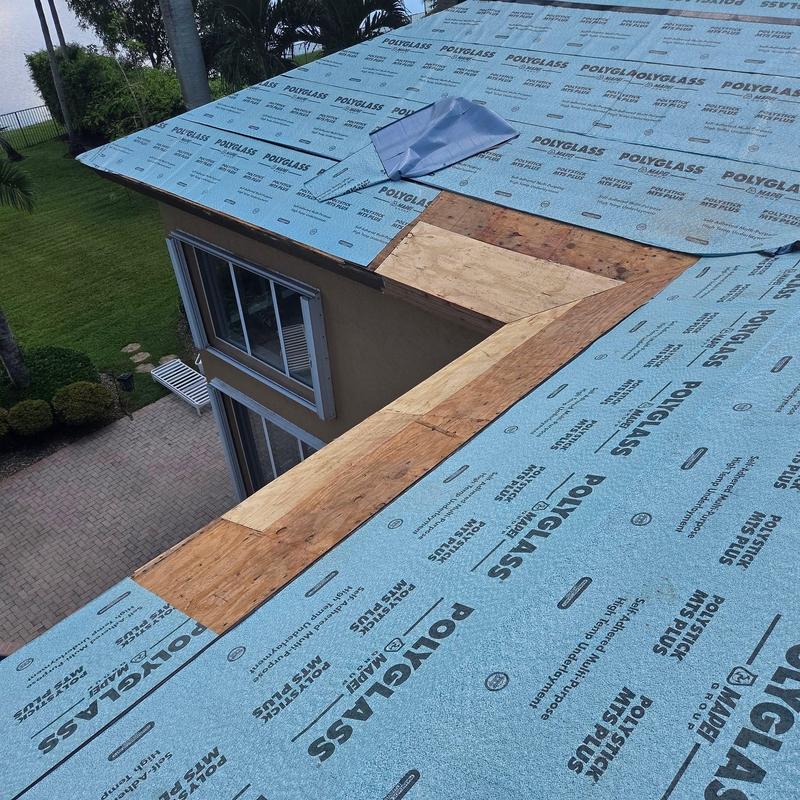 Concrete tile roof underlayment installation on house roof