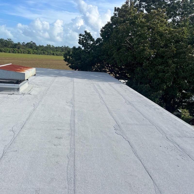 Commercial flat roof with new membrane installation Commercial flat roof with new membrane installation