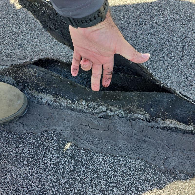Built-up roofing membrane delamination on commercial roof Built-up roofing membrane delamination on commercial roof