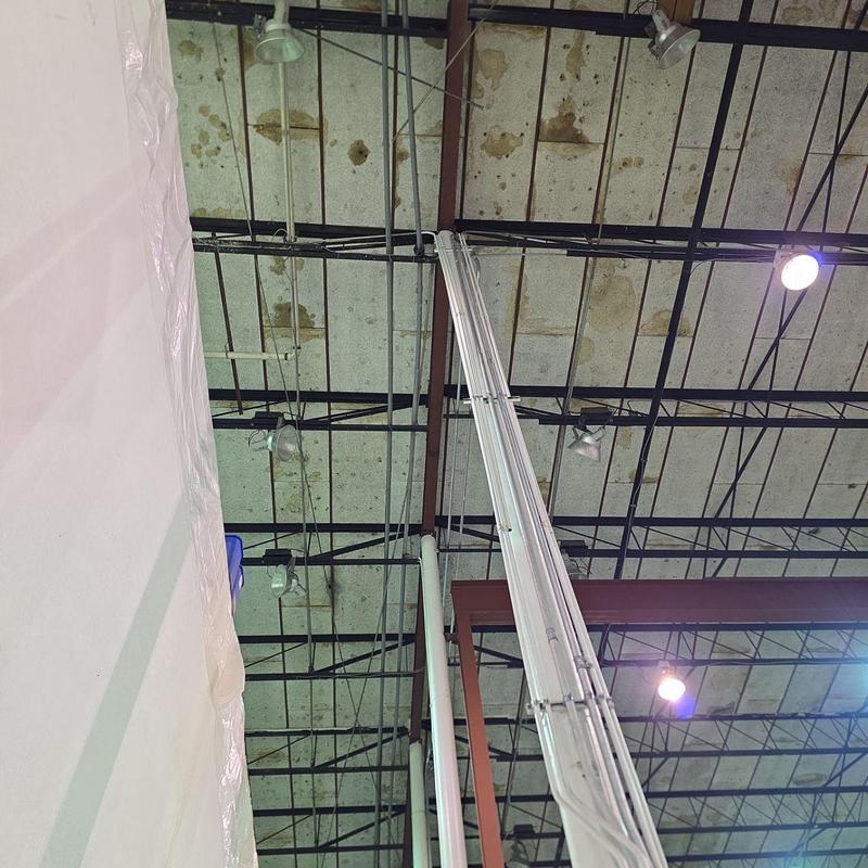 Commercial roof ceiling with water damage stains Commercial roof ceiling with water damage stains