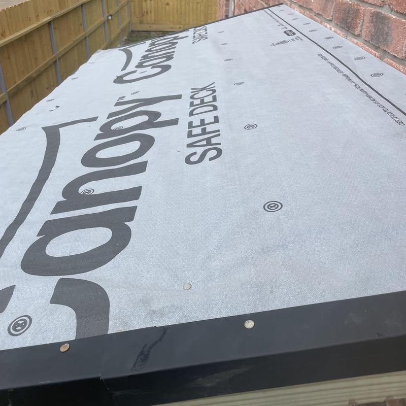 Porch cover roof decking with synthetic underlayment