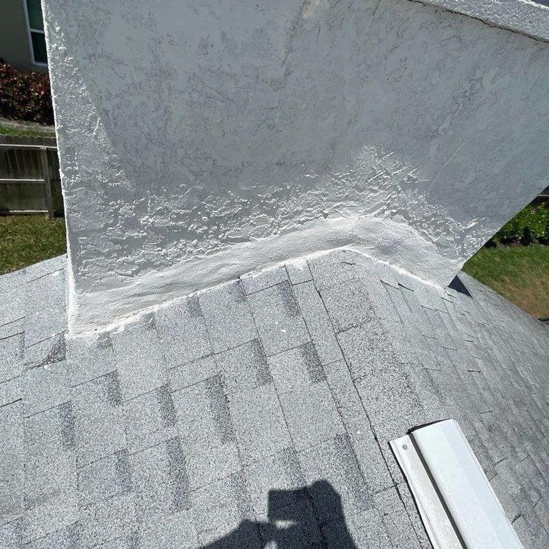 Roof shingles and chimney flashing with repair sealant