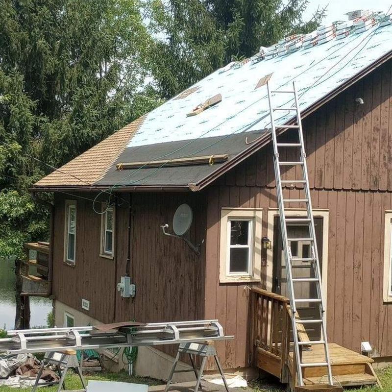Roof underlayment installation on residential home Roof underlayment installation on residential home