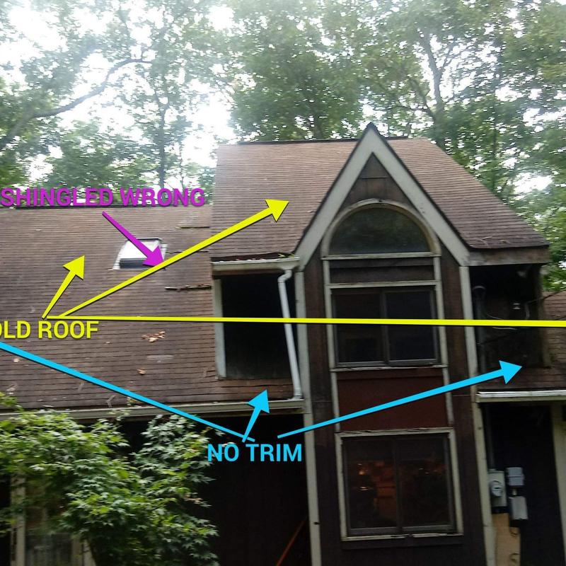 Asphalt shingle roof with damage and missing trim Asphalt shingle roof with damage and missing trim