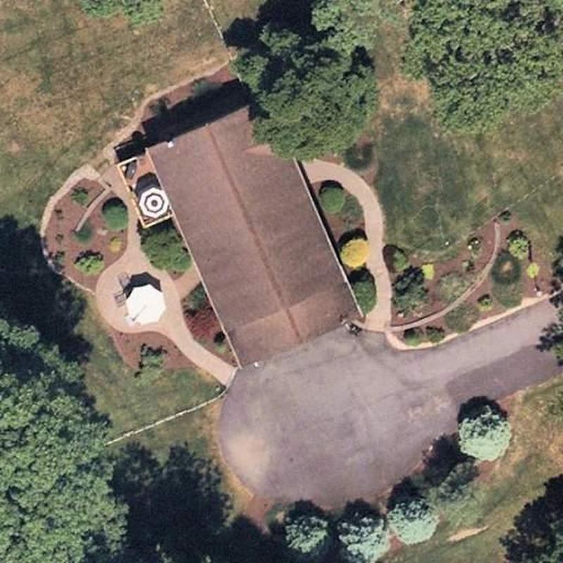 Asphalt shingle roof inspection with surrounding landscaping Asphalt shingle roof inspection with surrounding landscaping