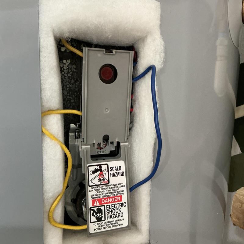 Water heater thermostat with wiring and warning labels